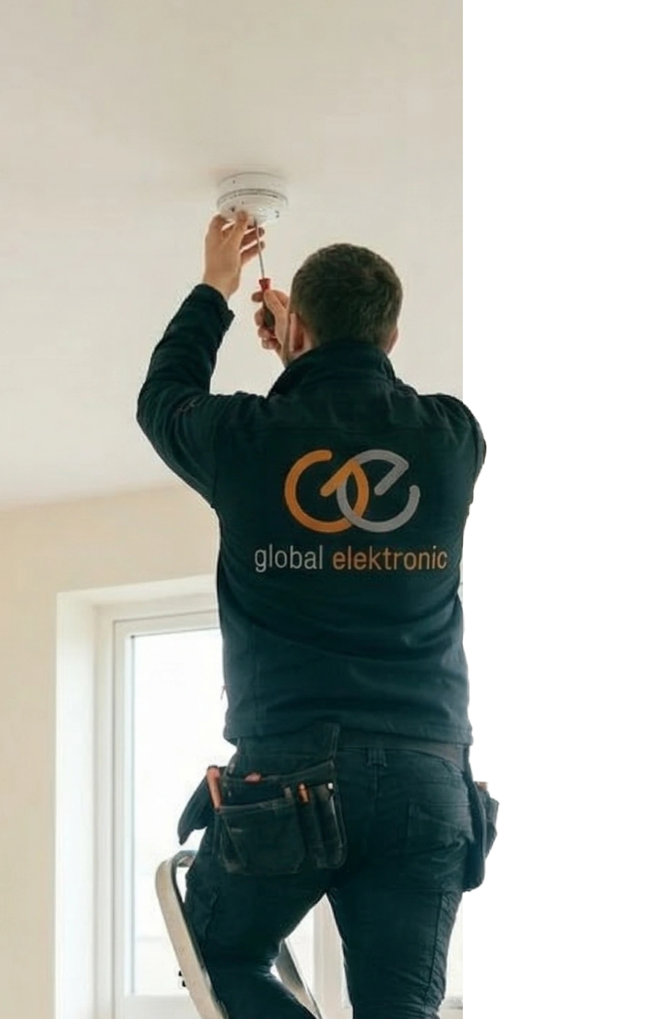 Technician installing a Jablotron security system